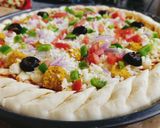 A picture of step 4 of Cheesy Bites Petals Pizza 🍕🍕.