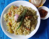 A picture of step 4 of Pudina rice.