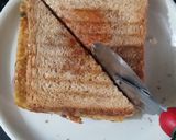 A picture of step 4 of Cheese chilla sandwich.