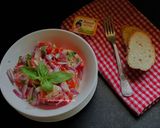 A picture of step 3 of Tomato Salad with Anchovy vinaigrette.