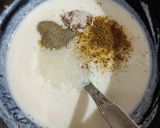 A picture of step 1 of Dahi Tadka.
