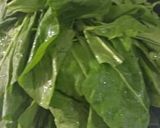 A picture of step 2 of Aloo palak.
