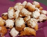 Foto del passaggio 7 della ricetta Fritole con pinoli, uvetta, grappa e profumo d'arancia