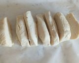 A picture of step 2 of Cacio and pepe breadsticks with prosciutto and goat's cheese.