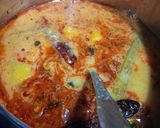 A picture of step 7 of Sambhar with idli.