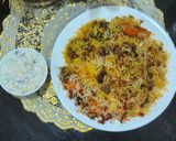A picture of step 3 of Mutton biryani with boondi and onion cucumber raita.