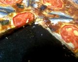 A picture of step 4 of Sardine quiche, sliced ​​tomatoes.