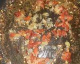 A picture of step 10 of Tuscan Chicken & Shrimp pasta.