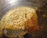 A picture of step 1 of Dana Methi stuffed Mirchi.
