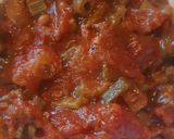 A picture of step 6 of Μπάμιες/Bamies--Greek style braised okra with tomatoes.