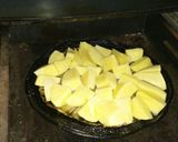 Foto del paso 4 de la receta: Alitas de pollo con papas al horno😋😋😋😋