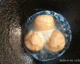 A picture of step 5 of Fry Litti in ghee.