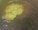 A picture of step 1 of Gobhi musallam.