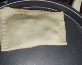 A picture of step 3 of Cheese pocket pizza.
