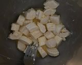 Une image de l'étape 4 de Courgettes farcies au chèvre.
