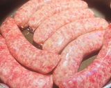 A picture of step 2 of Bratwurst 🌭 with Peppers and Onions 🧅.