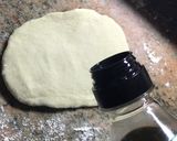 A picture of step 2 of Samosa and a chutney.