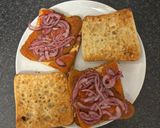 A picture of step 5 of Crispy Chicken Sandwich with Pickled Red Onion and Sriracha Mayo.