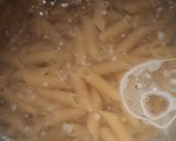 A picture of step 2 of Volcanic chicken with white sauce pasta.