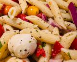A picture of step 5 of Mozzarella and Tomato Penne Lemon Salad.