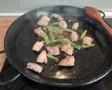 A picture of step 4 of Chicken and Vegetable Paella.