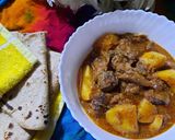 A picture of step 7 of Alu gosht.