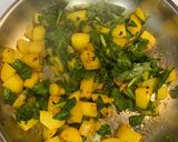 A picture of step 4 of Braised Potatoes with Spinach.