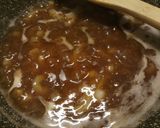 A picture of step 2 of Pigs in blankets, mash and onion gravy.