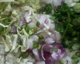 A picture of step 2 of Poha dry manchurian.