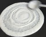 A picture of step 2 of Cheesy Jini Dosa.