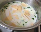 A picture of step 3 of Easy Homemade Queso Dip/Cheese Sauce.