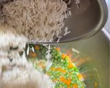 صورة لخطوة 4 من وصفة رز بالبسلة والجزر والزنجبيل
