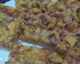 A picture of step 11 of Chicken Macon barbeque pizza.