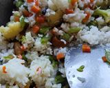 A picture of step 5 of Leftover Rice Pulau.