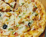 A picture of step 9 of Cheesy Bites Petals Pizza 🍕🍕.