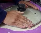A picture of step 2 of Rotli tortilla for any kind of wraps.
