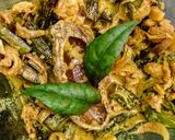 A picture of step 7 of Bhindi Curry with mustard paste.