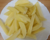 Foto del paso 5 de la receta: Patatas fritas en salsa amarilla