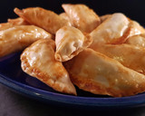 Foto del paso 10 de la receta: Empanadillas de sepia y patata al horno