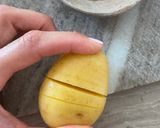 A picture of step 2 of Hasselback truffle roasted potatoes.