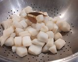 Foto del paso 4 de la receta: Pota al Vapor con Patatas en Nido
