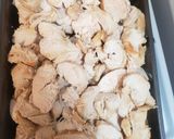 A picture of step 8 of Chicken breast on a bed of sauted apples and onions.