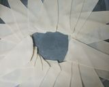 A picture of step 10 of Indian style crescent ring.