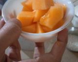 A picture of step 1 of Muskmelon Coconut smoothie.