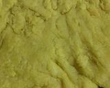 A picture of step 8 of Besan jimiknd (Pittora) with Gravy.
