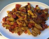 Une image de l'étape 10 de Courgette et tomates au parmesan et épices italiennes.
