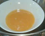 Une image de l'étape 2 de Jus mandarine / grenade.