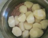 A picture of step 1 of Achari masoor pulao.