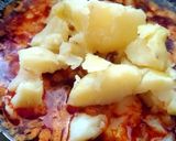 A picture of step 7 of Dahi Aloo.