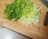 Foto del paso 9 de la receta Chuletas de cerdo adobadas con puré de papas, guisantes y salsa